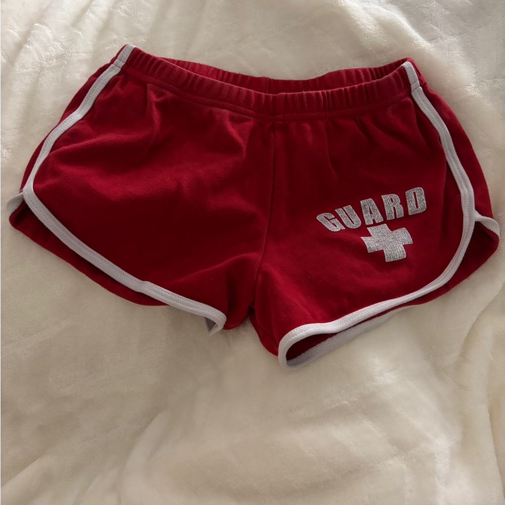 Red Women's Guard Shorts With "Guard" On Back
